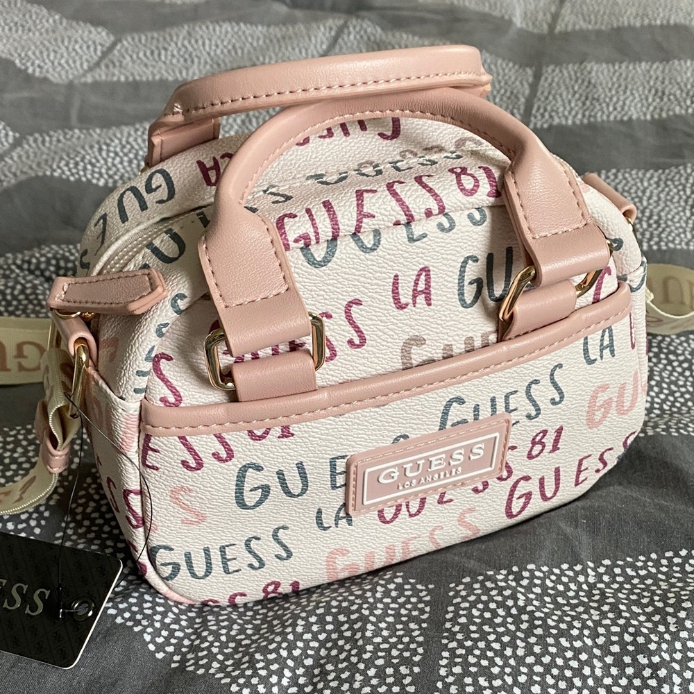 GUESS Logo Print Mini Bag in Pink and Cream